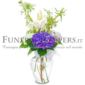 Mazzo funebre di gigli bianchi con fiori viola