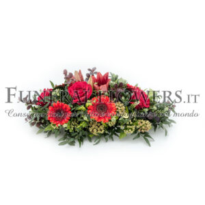 Cuscino funebre di fiori rossi