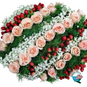 Composizione floreale funebre con rose rosa